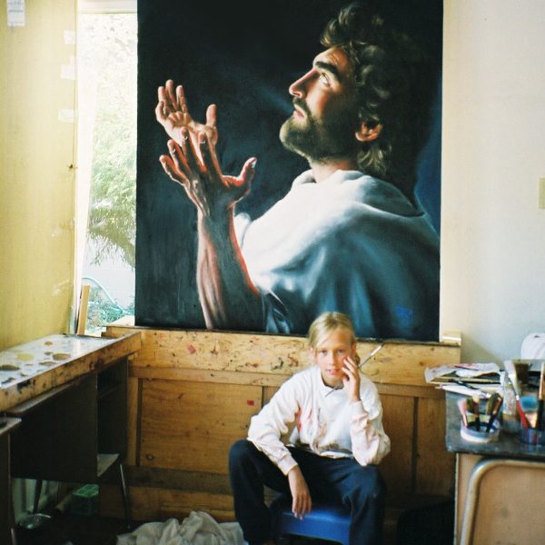 Akiane with Father Forgive Them painting at Age 8