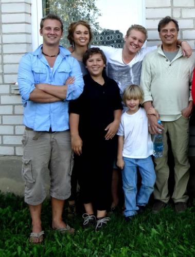 With-her-Dad-and-four-brothers-at-the-grandmother's-homestead-in-Lithuania--min